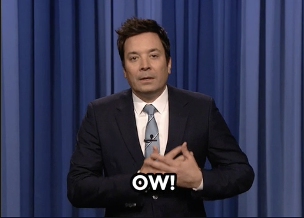 jimmy fallon holding his chest saying &quot;ow!&quot;