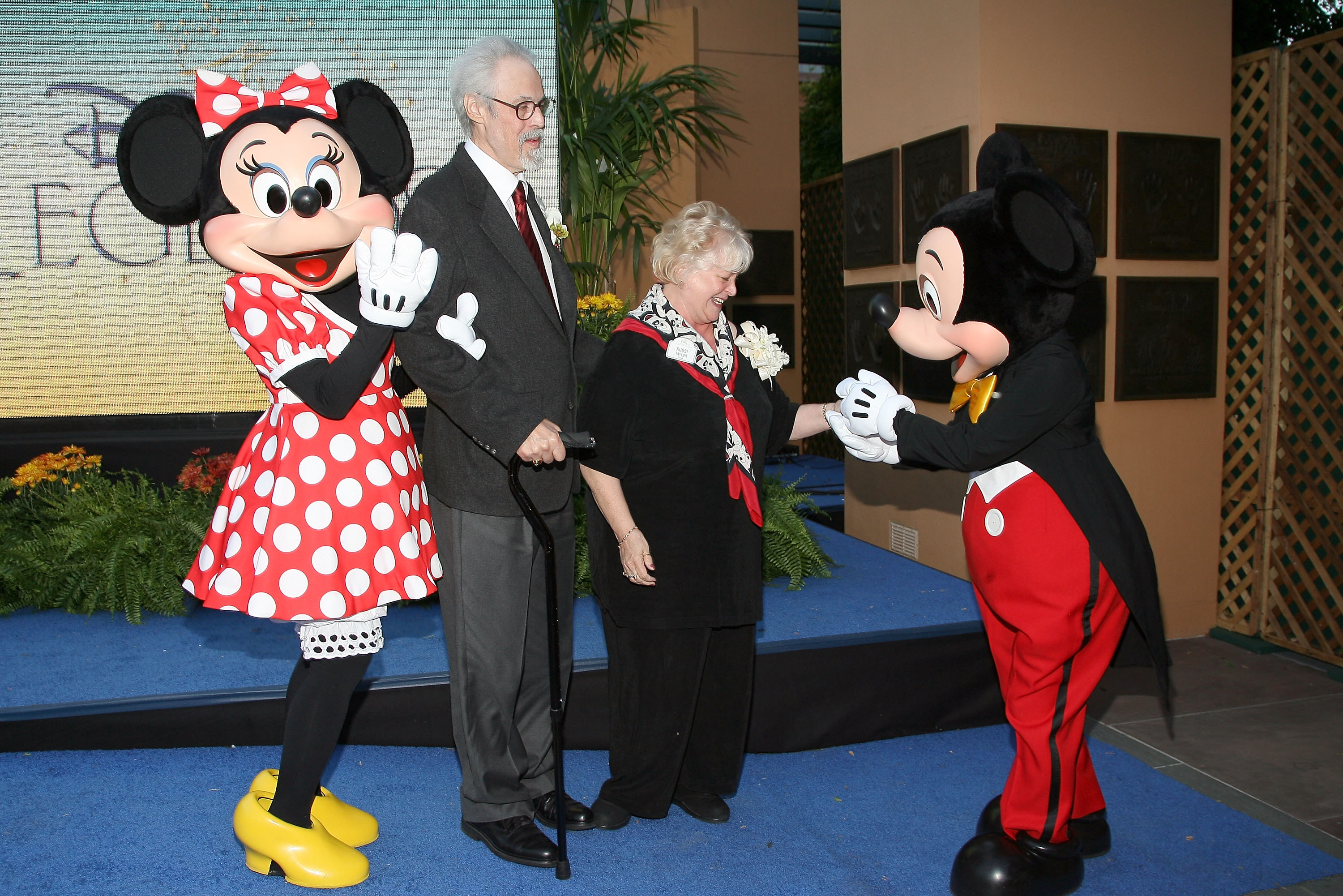 Mickey and Minnie Mouse with their voice actors