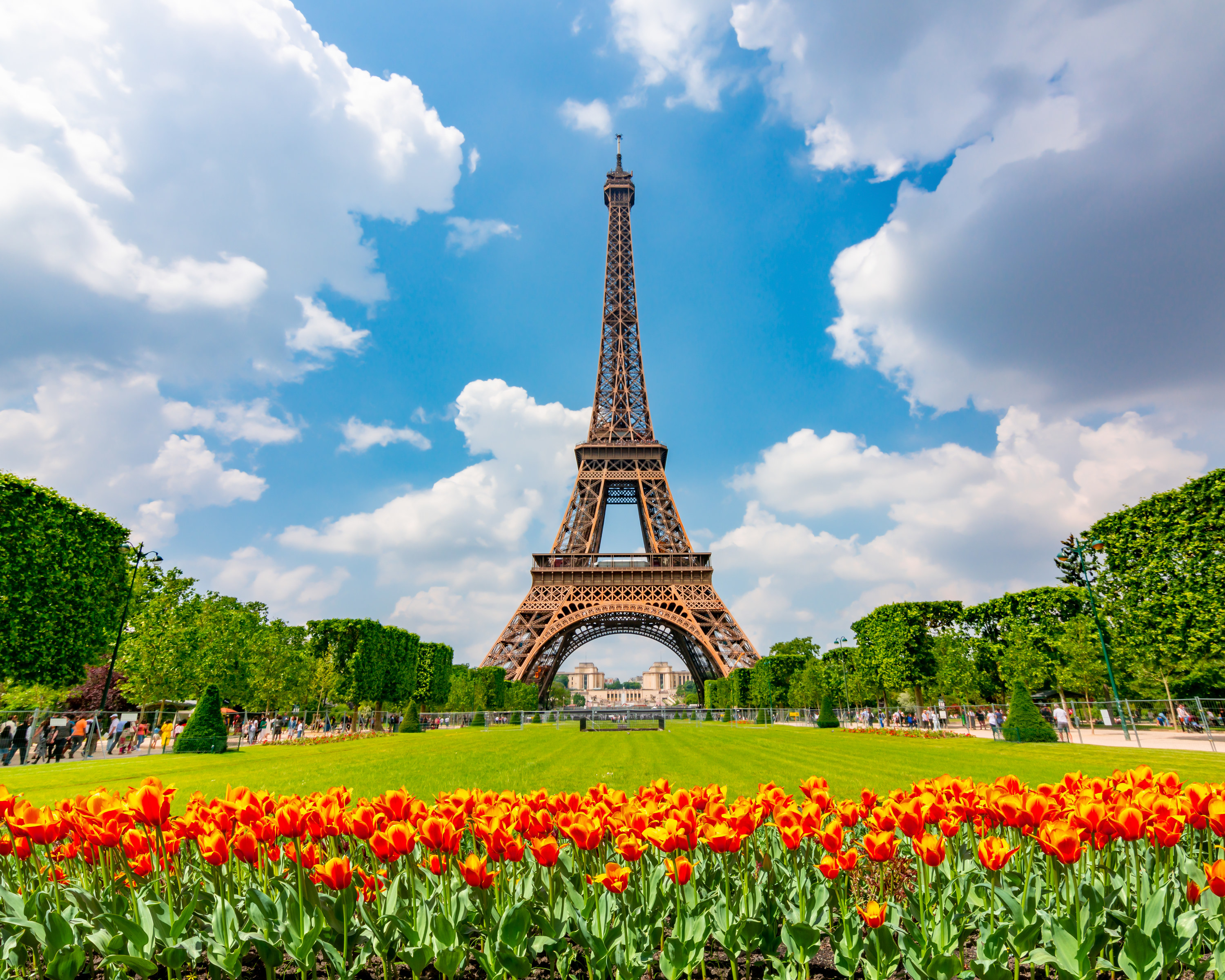 An open-lattice wrought-iron tower with an antenna at the top