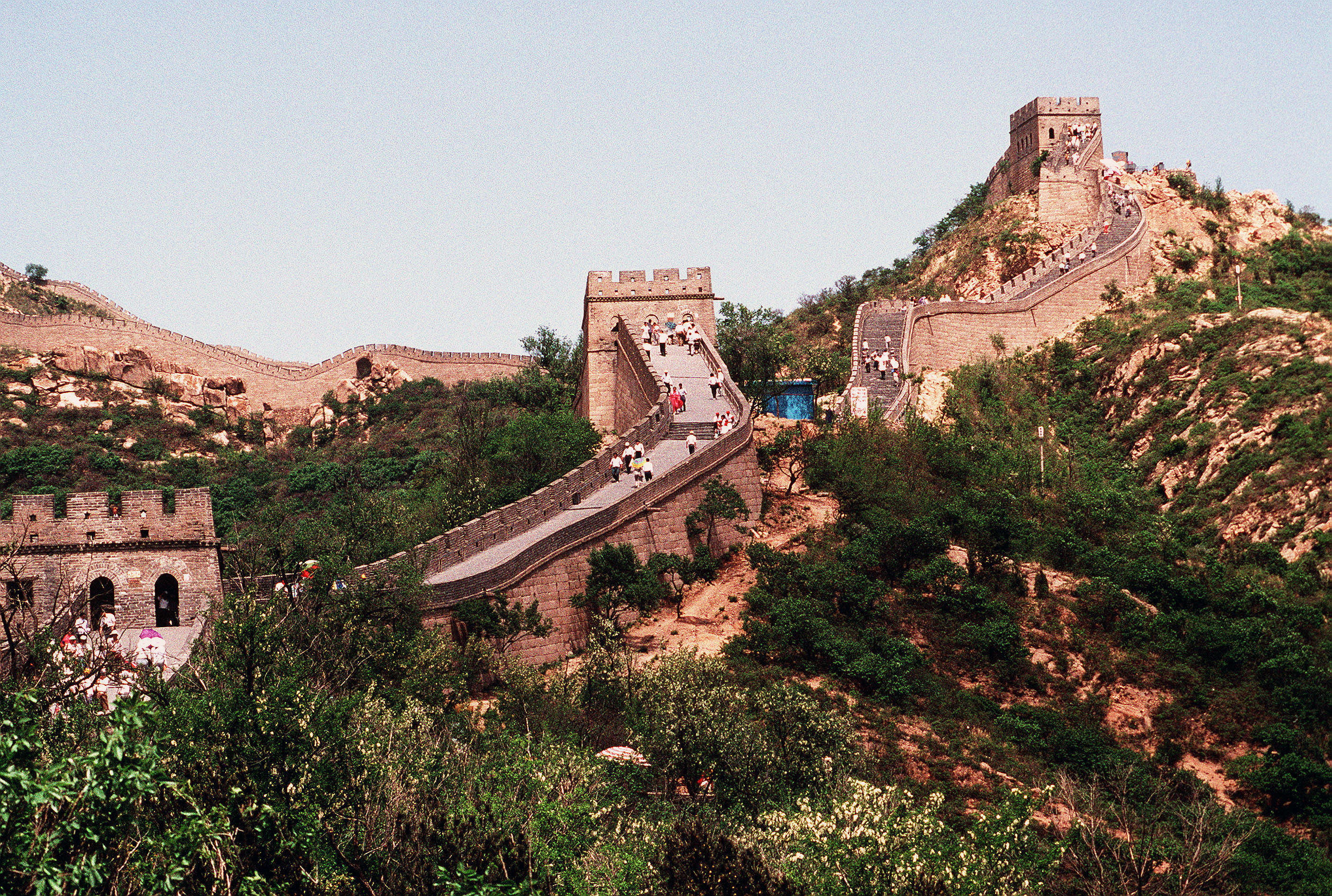 A winding series of steps, walls, and fortifications through a mountain