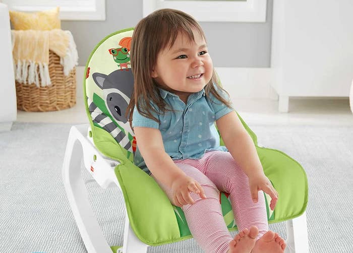 toddler sitting in the chair