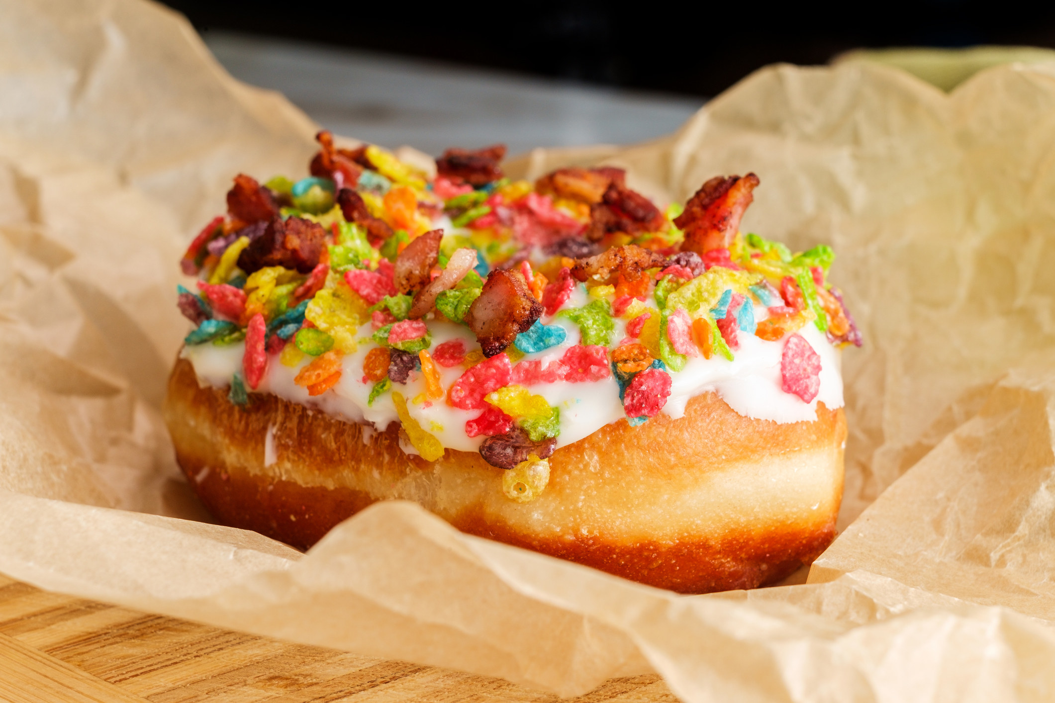 A bacon fruity rainbow cereal donut