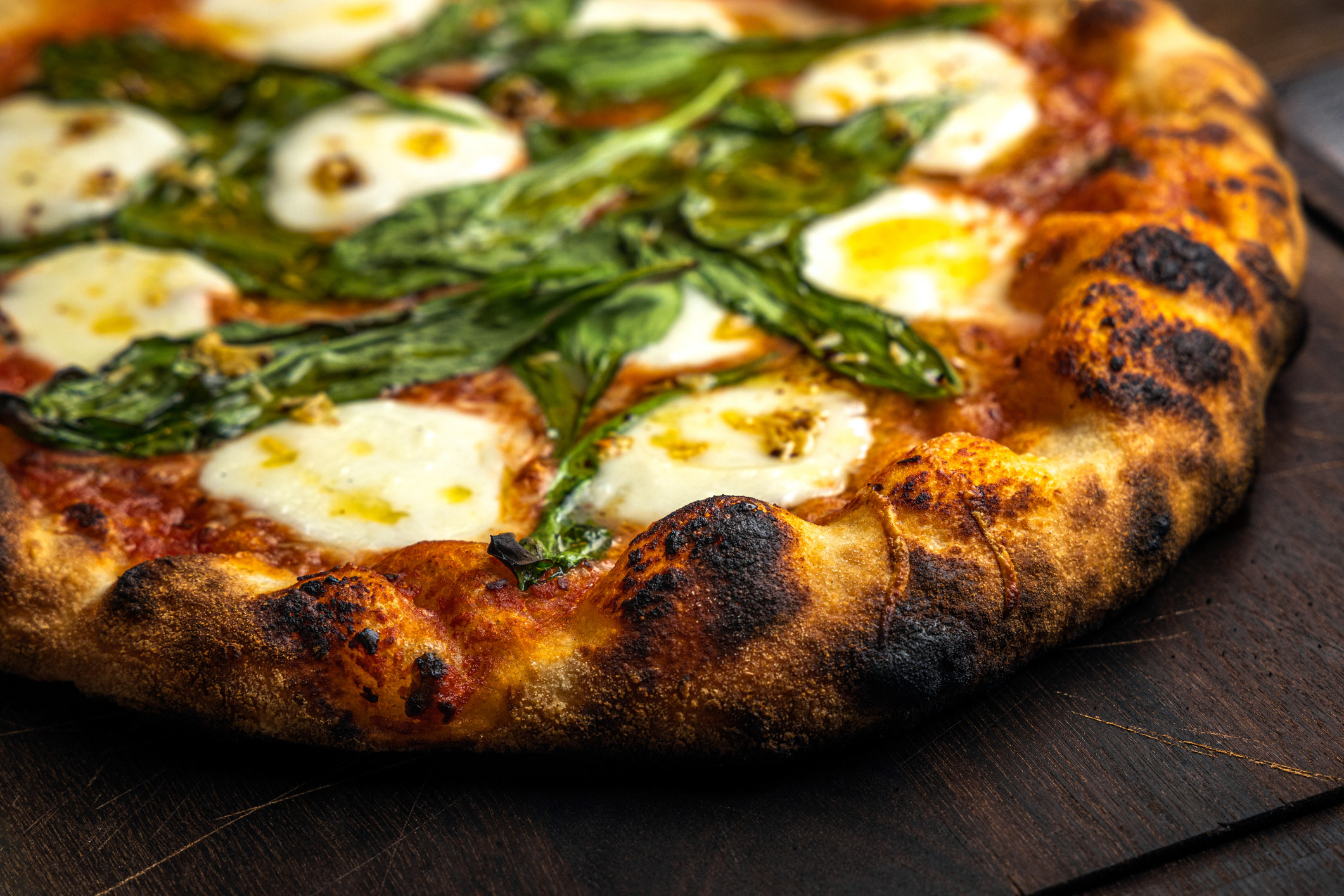 A close-up Neapolitan pizza