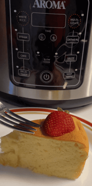gif of fork pressing a slice of sponge cake, to show fluffiness