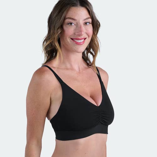 model wearing the black bra that goes straight across the boobs and has no cups with t-back straps