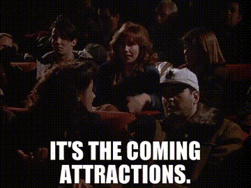 A woman in a movie theater saying: &quot;It&#x27;s the coming attractions&quot;