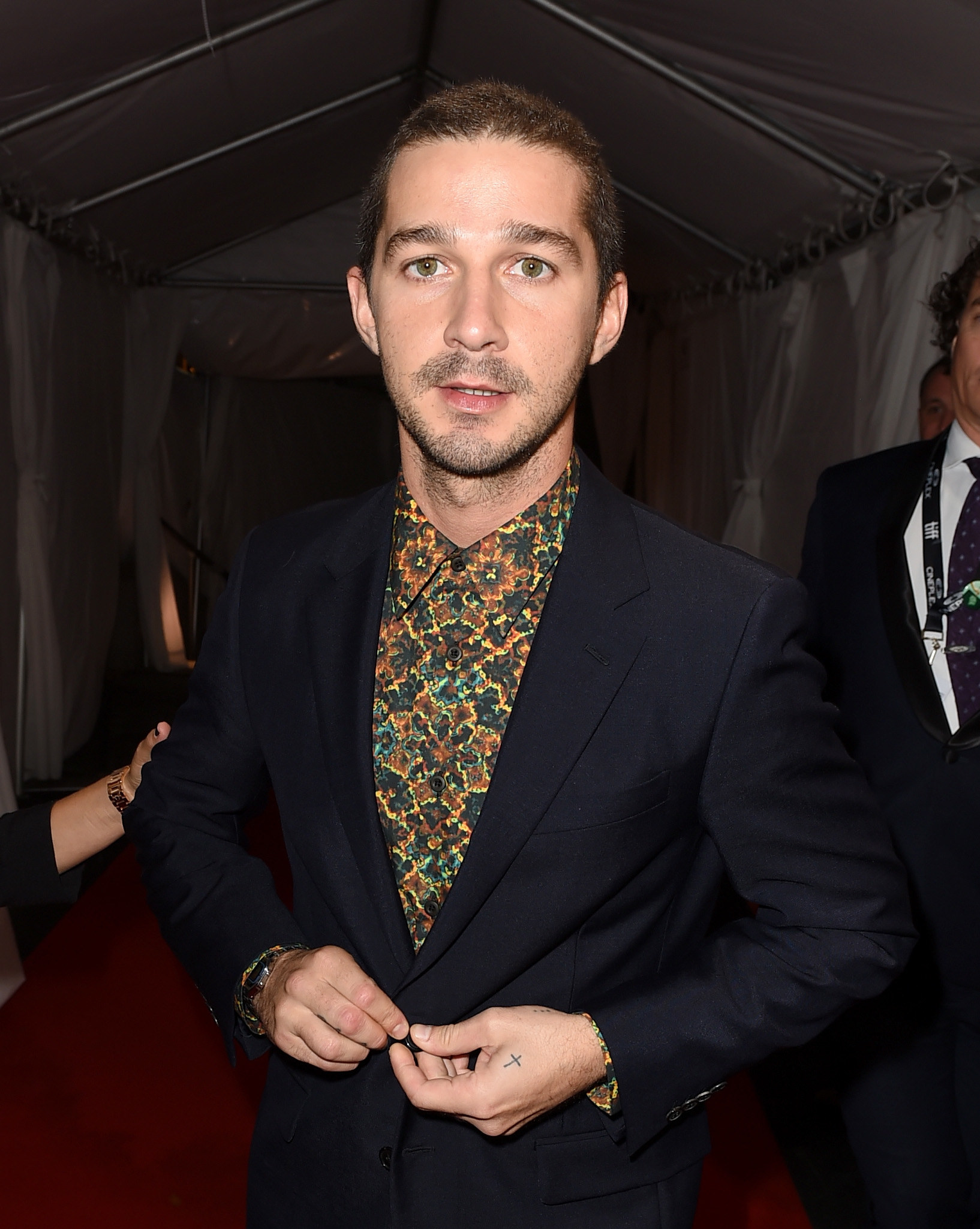 Shia in a suit