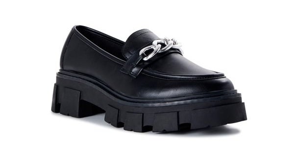 Black chunky loafers with silver chain across the front