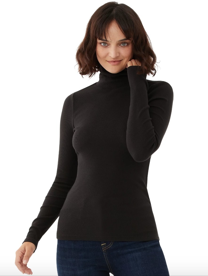 Model wearing long black sleeve turtleneck