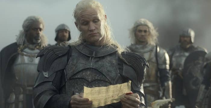 Daemon reading a note from his brother