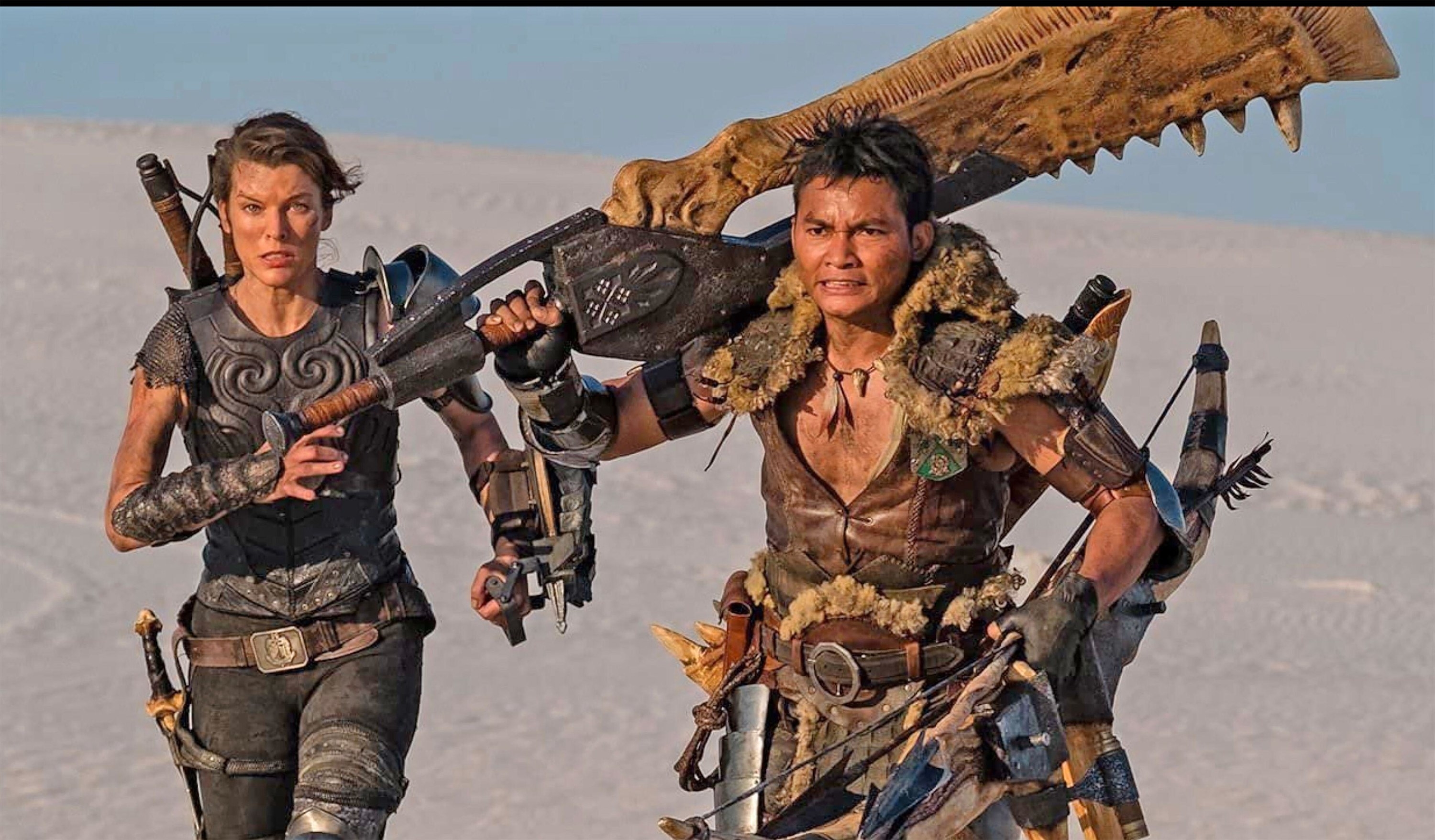 Milla Jovovich and Tony Jaww rock out in medieval swag in &quot;Monster Hunter&quot;