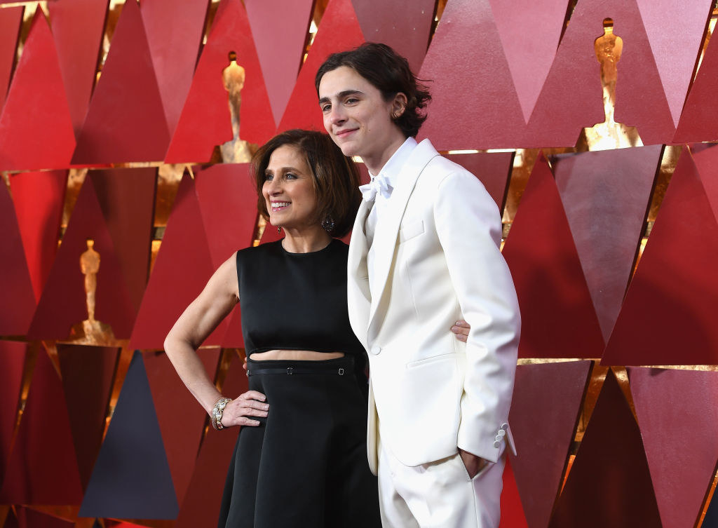 Timothée with his mom on the red carpet