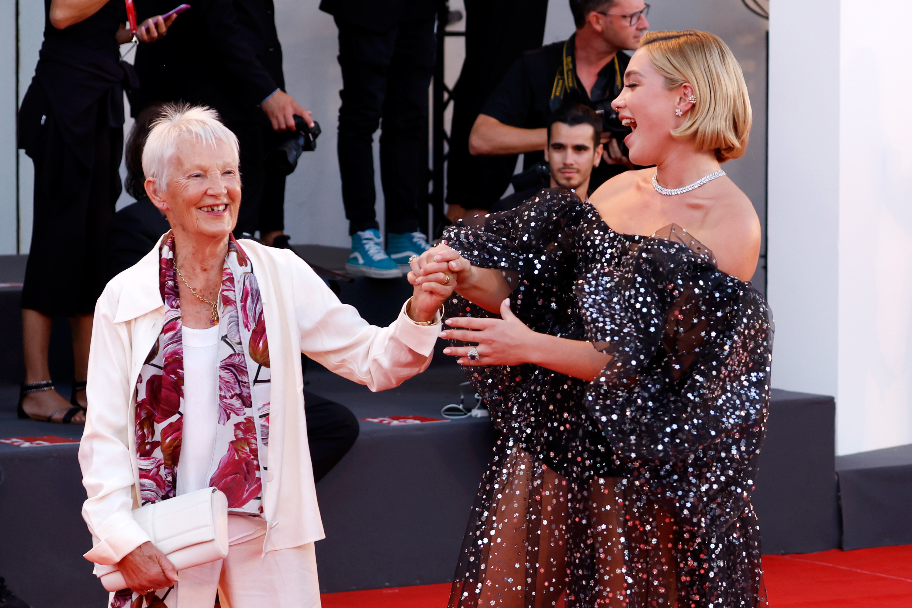 Florence smiles and holds her grandma&#x27;s hand up