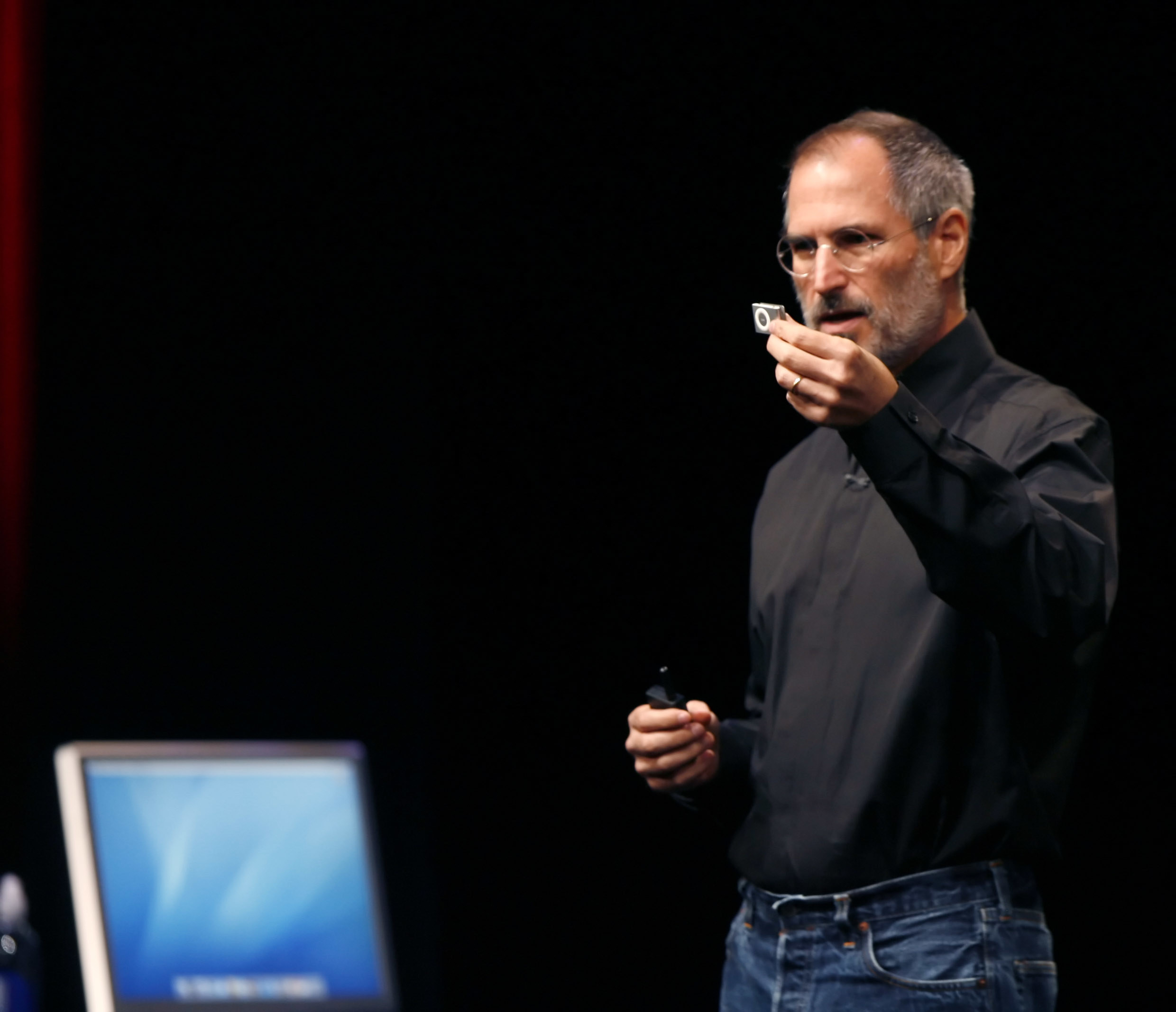 Steve Jobs holds the new iPod Shuffle in 2006