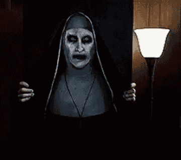 A painting of a Nun flies at the camera in a jump scare