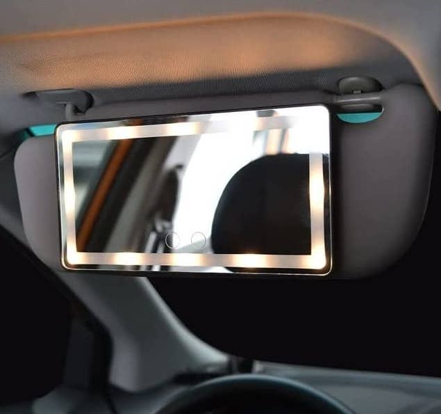 an LED sun visor mirror in a car