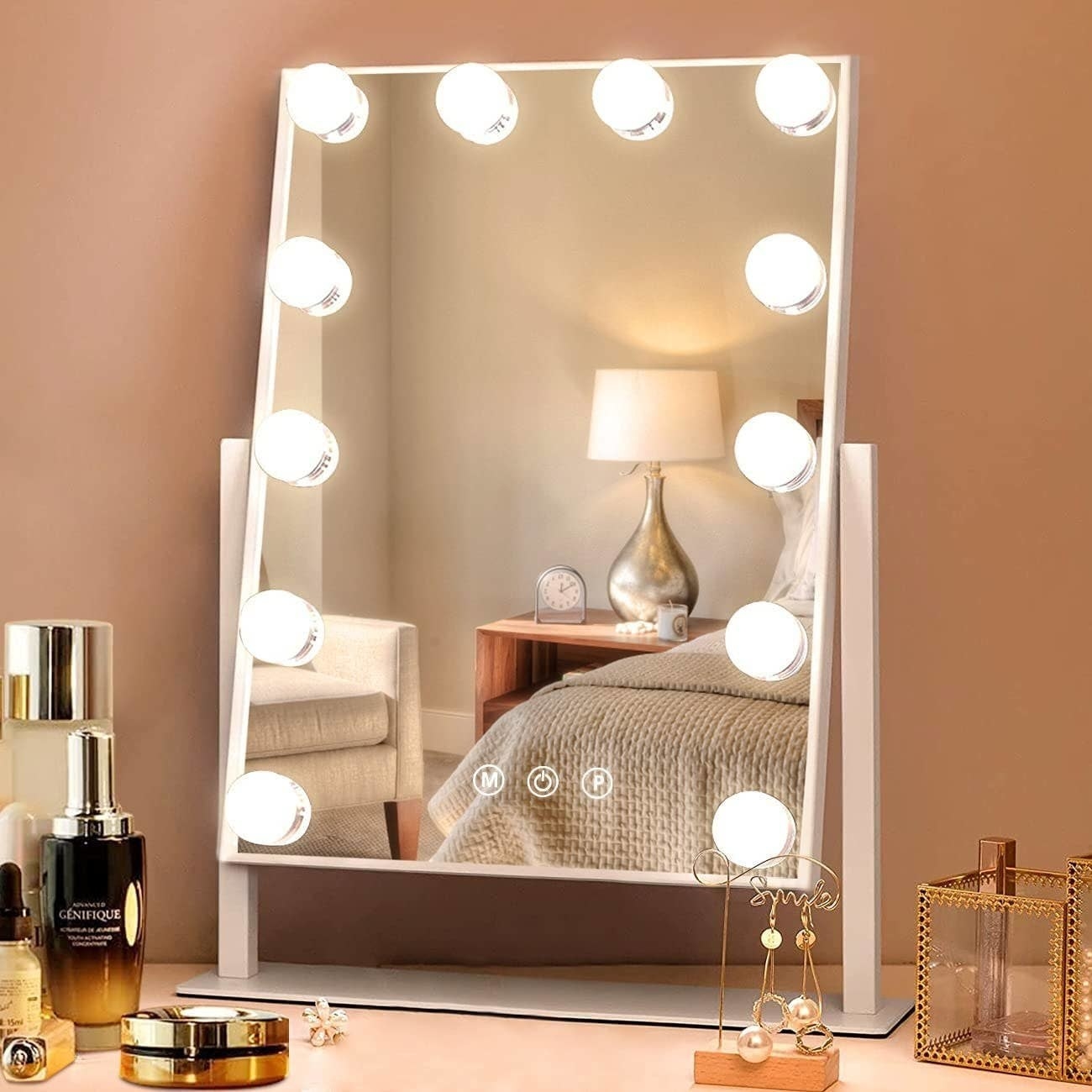 a light-up vanity mirror on a vanity