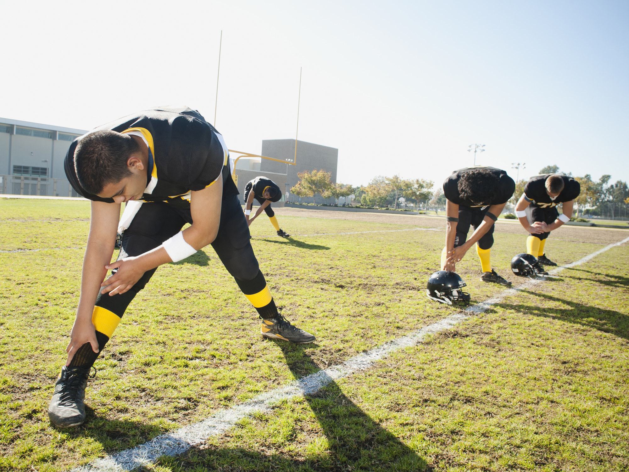 football players stretching