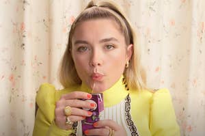 Florence Pugh sipping on a juice box