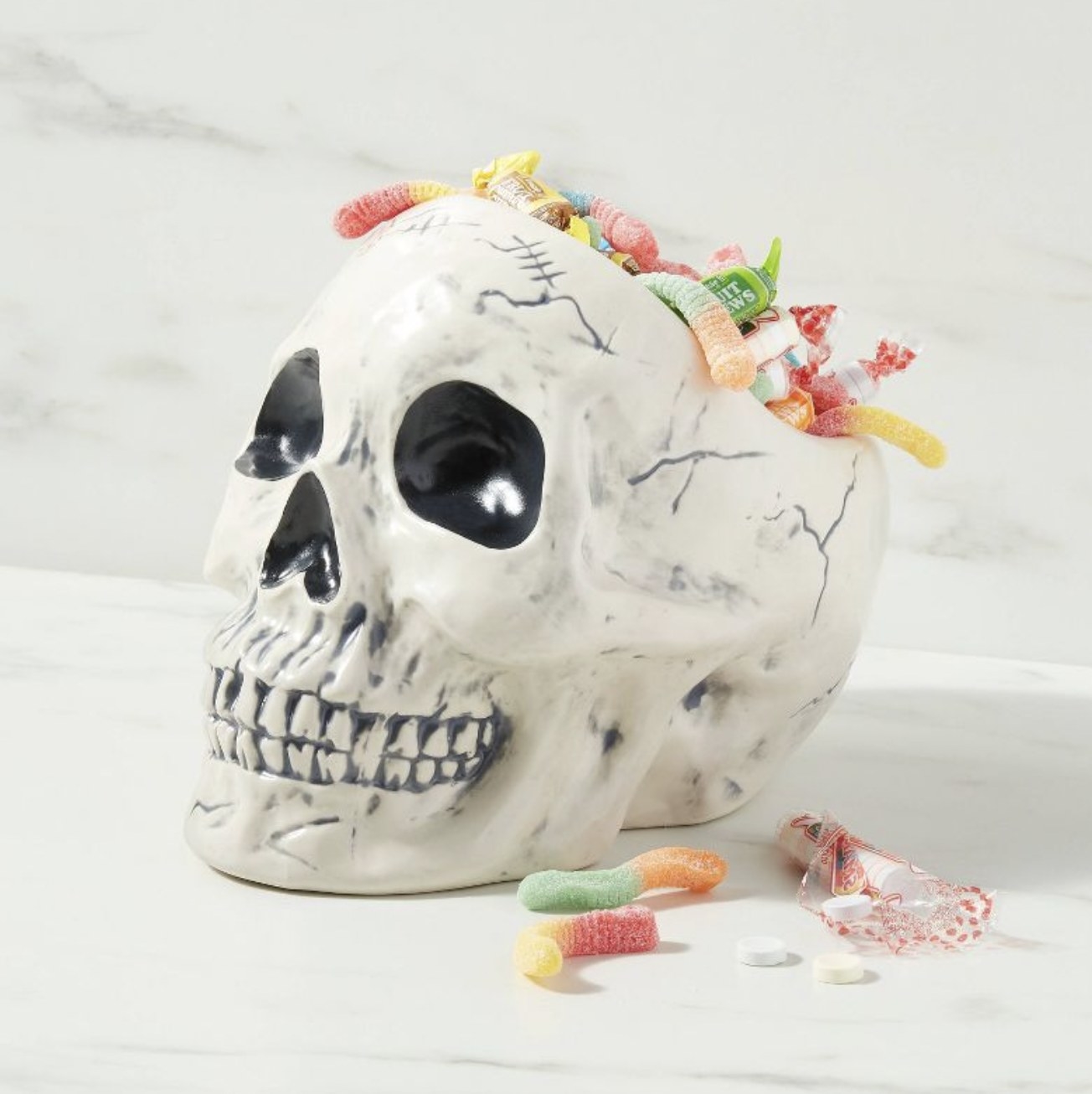 The skull dish with sour gummy worms bursting out the opening in the top