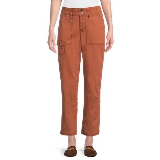 Model wearing orange cargo pants with brown loafers
