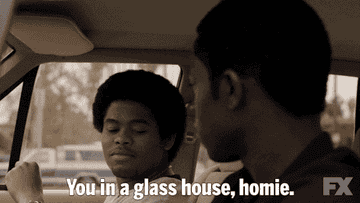 Someone telling Franklin that he is in a glass house and put down the stone