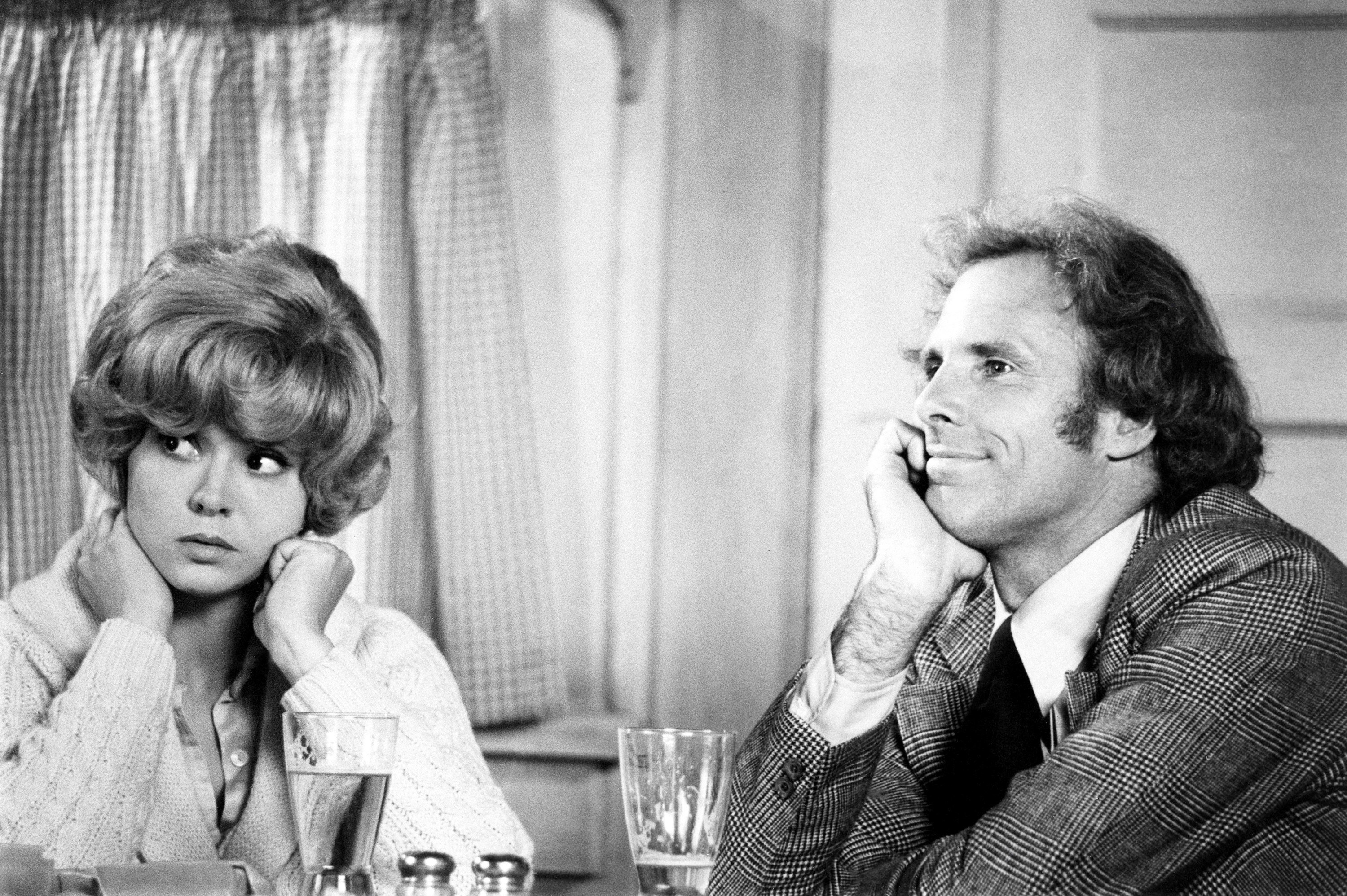 Barbara Harris and Bruce Dern staring at something.