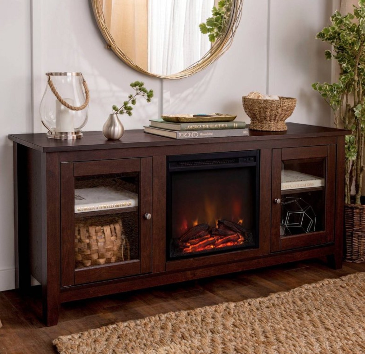the tv stand with a fireplace