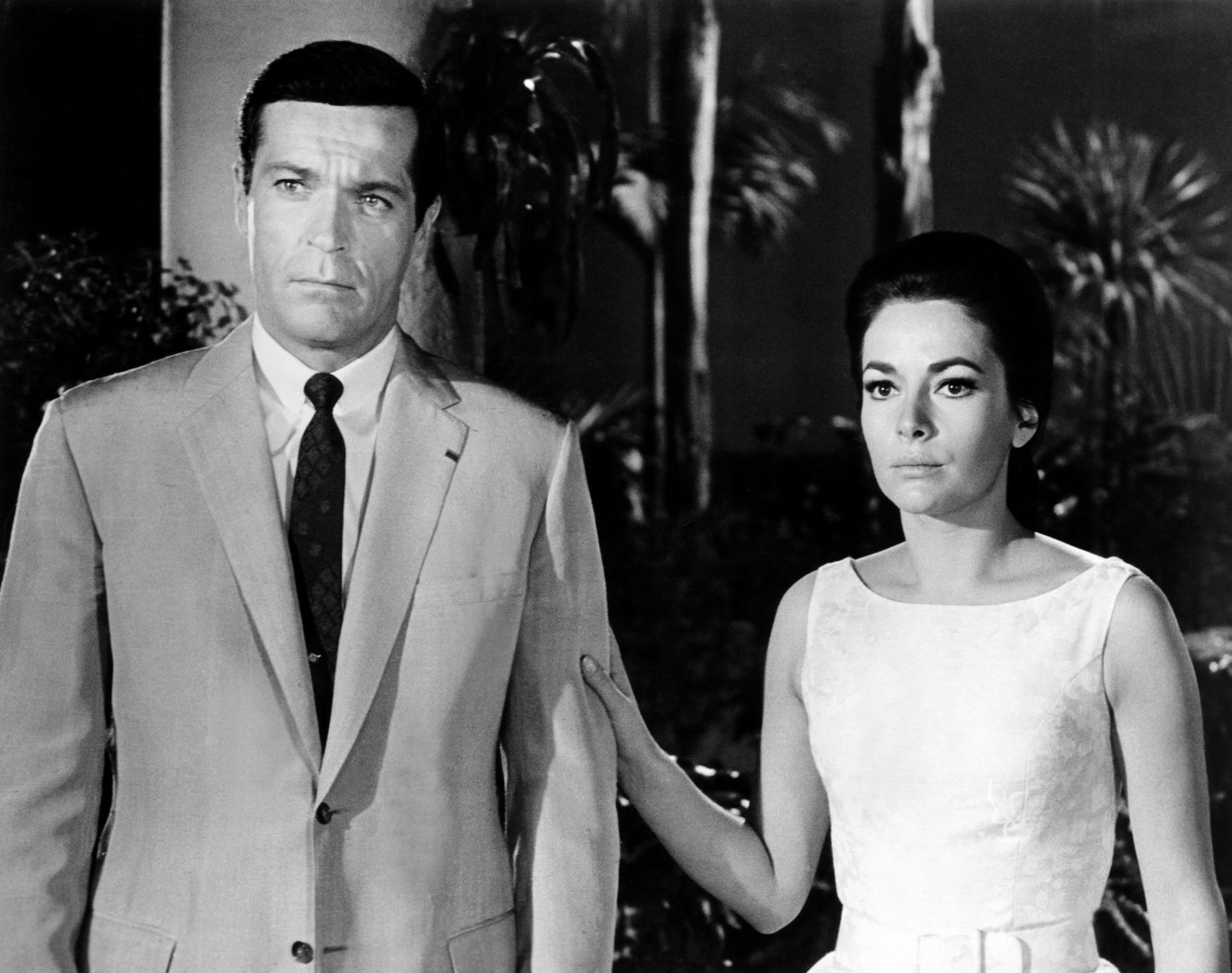 Frederick Stafford and Karin Dor standing next to each other.