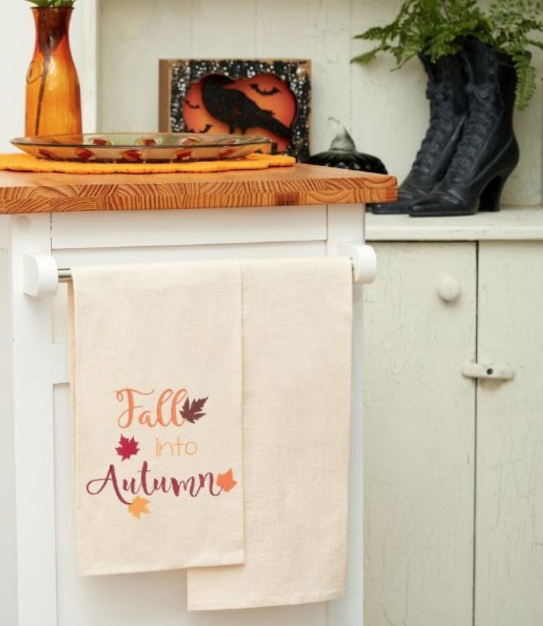 the dishtowel that reads &quot;fall into autumn&quot;