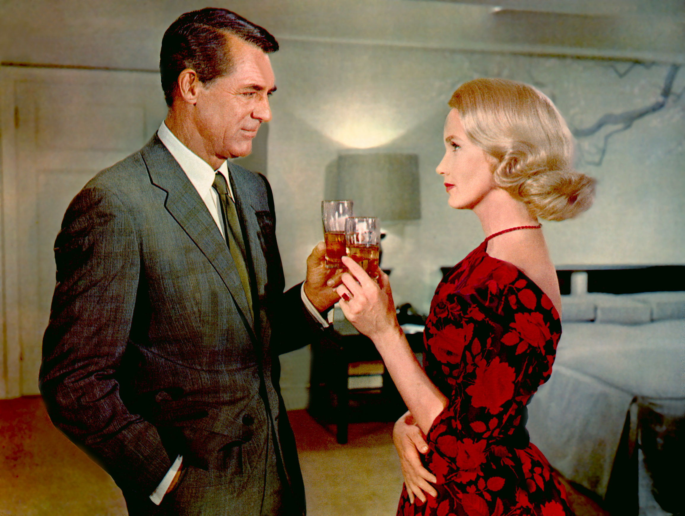 Cary Grant having a drink with Eva Marie Saint.