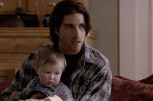 matthew fox in party of five holding his character's baby brother