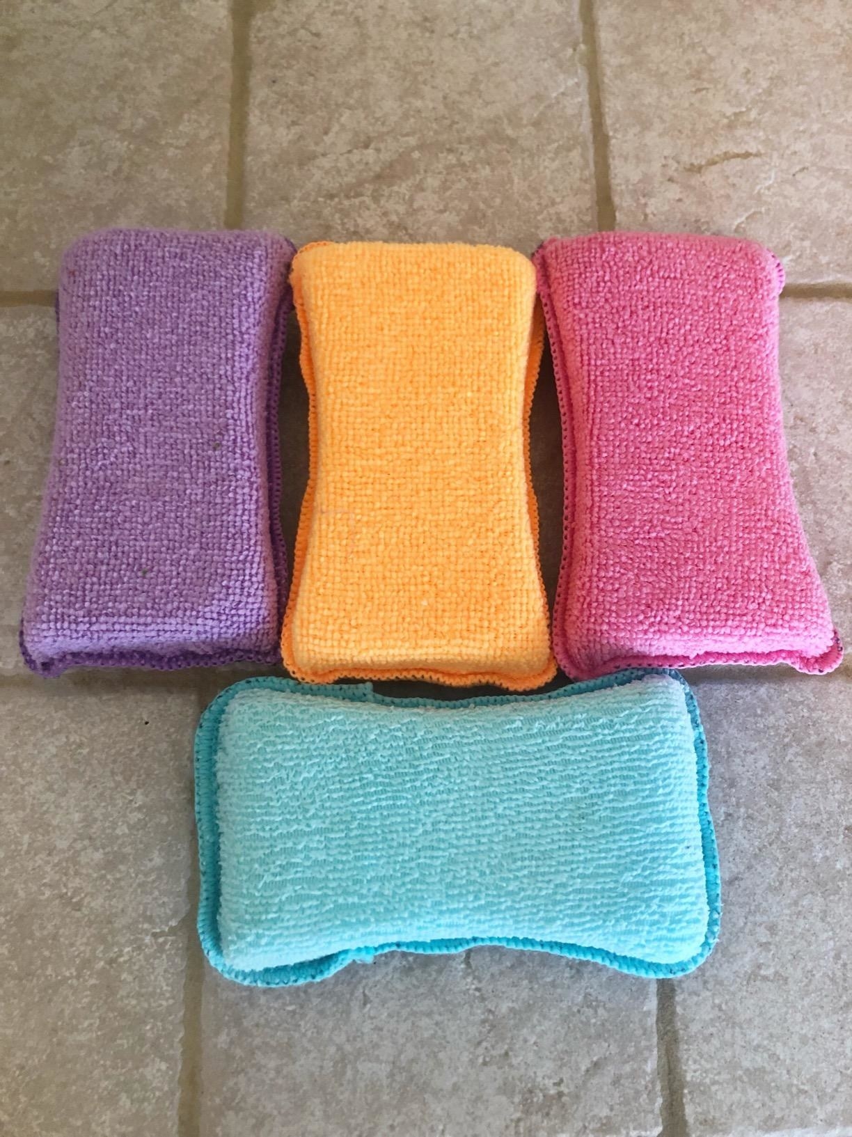 Reviewer image of four colorful sponges