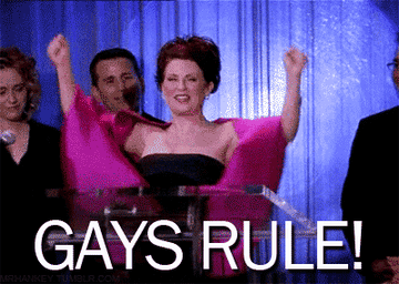 Karen Walker throws her arms in the air as she says, &quot;Gays rule&quot;