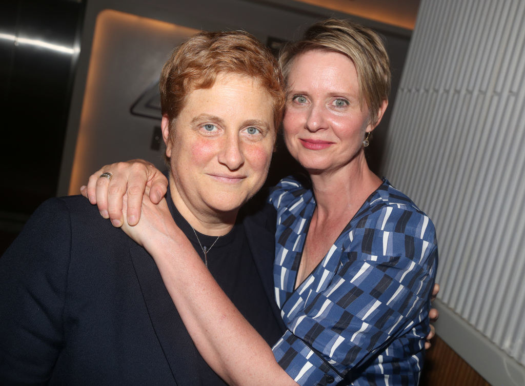 Christine Marinoni and Cynthia Nixon wears a brightly colored patterned blouse