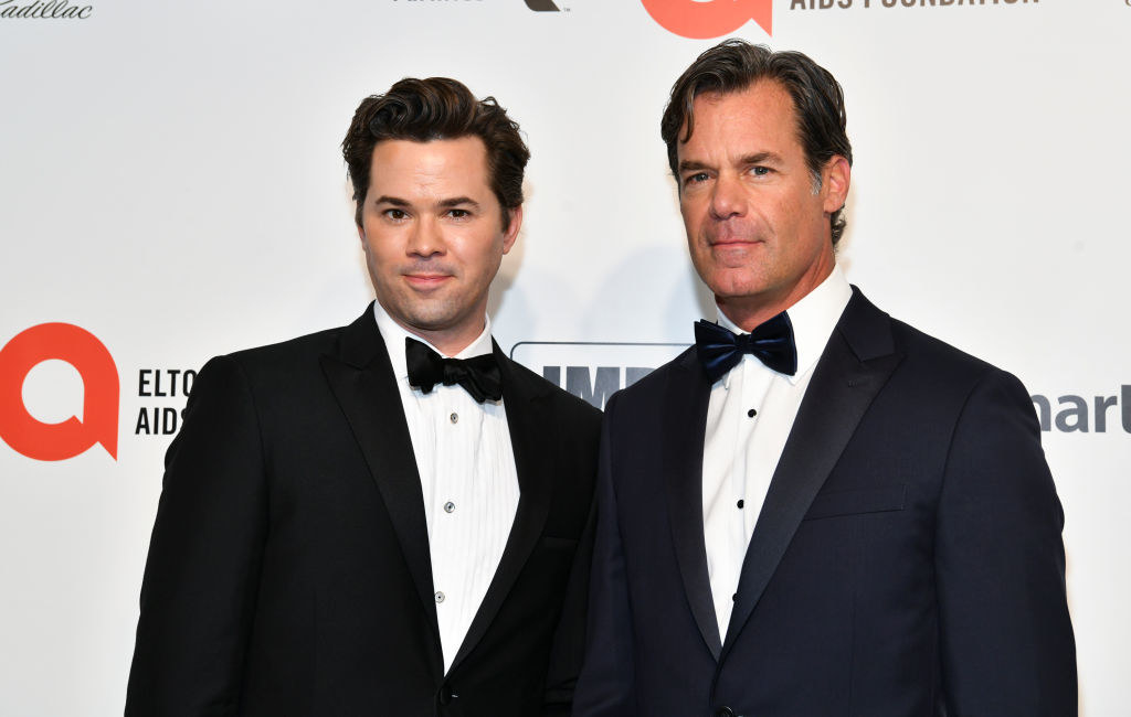 Andrew Rannells and Tuc Watkins wear dark suits