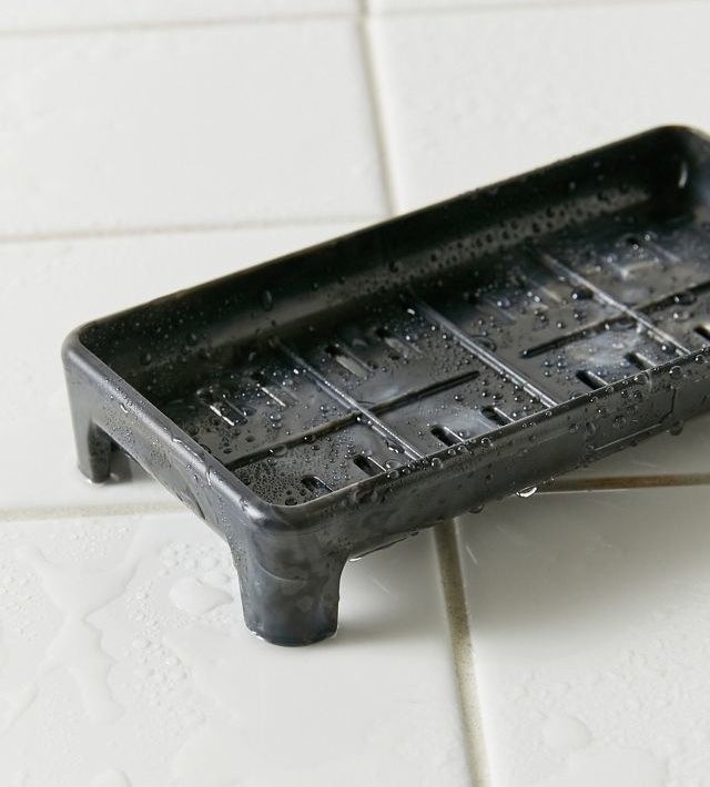 a soap dish with drainage slots