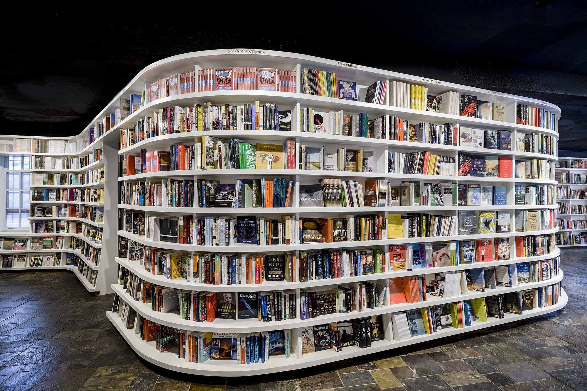 rounded bookshelves in a store