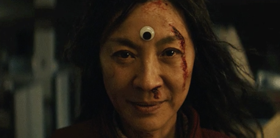 Michelle Yeoh with a googly eye on her forehead