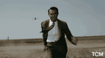 A man running from a plane