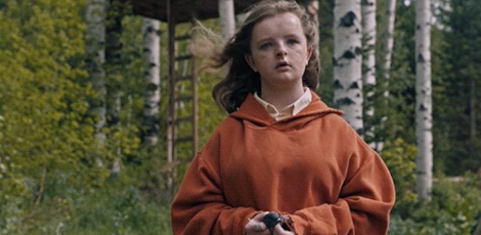 The daughter from &quot;Hereditary&quot; outside in the woods