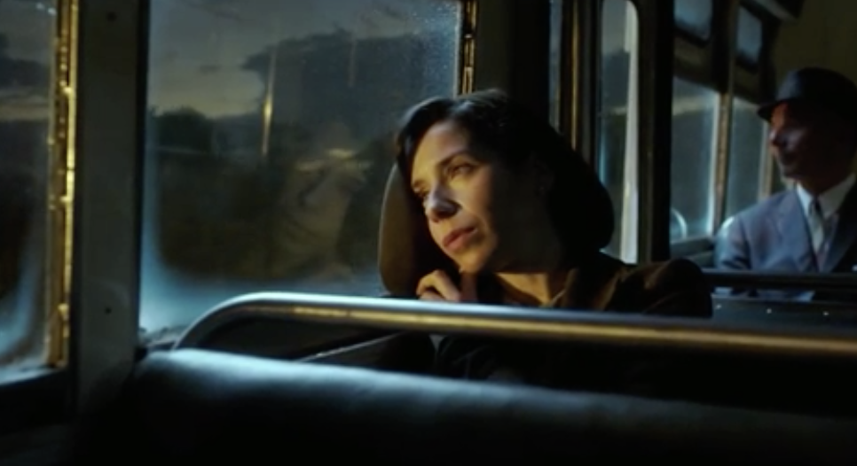 A woman sitting on a bus