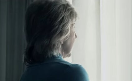 woman stares out window in &quot;insidious&quot;