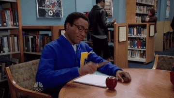 Troy in &quot;Community&quot; closing his folder