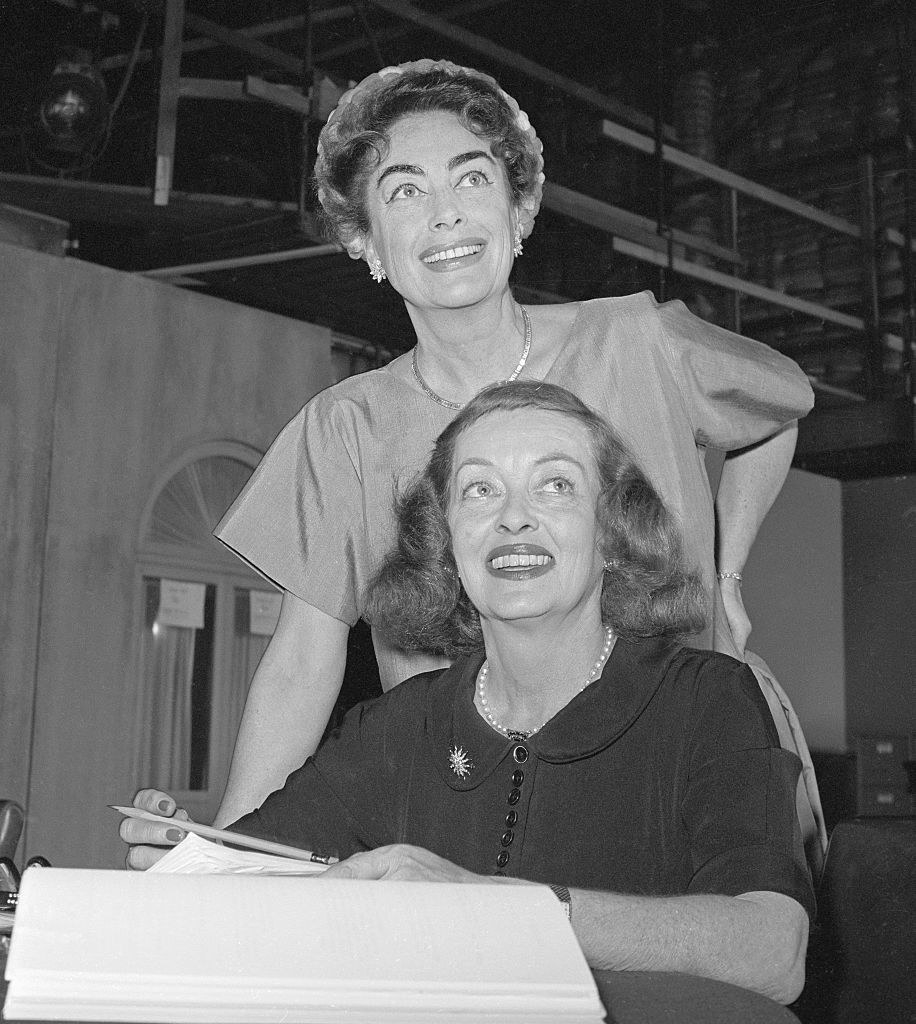 Davis and Crawford at a sound stage