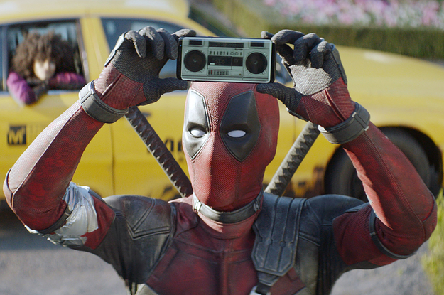 ryan reynolds holding up a boombox in deadpool