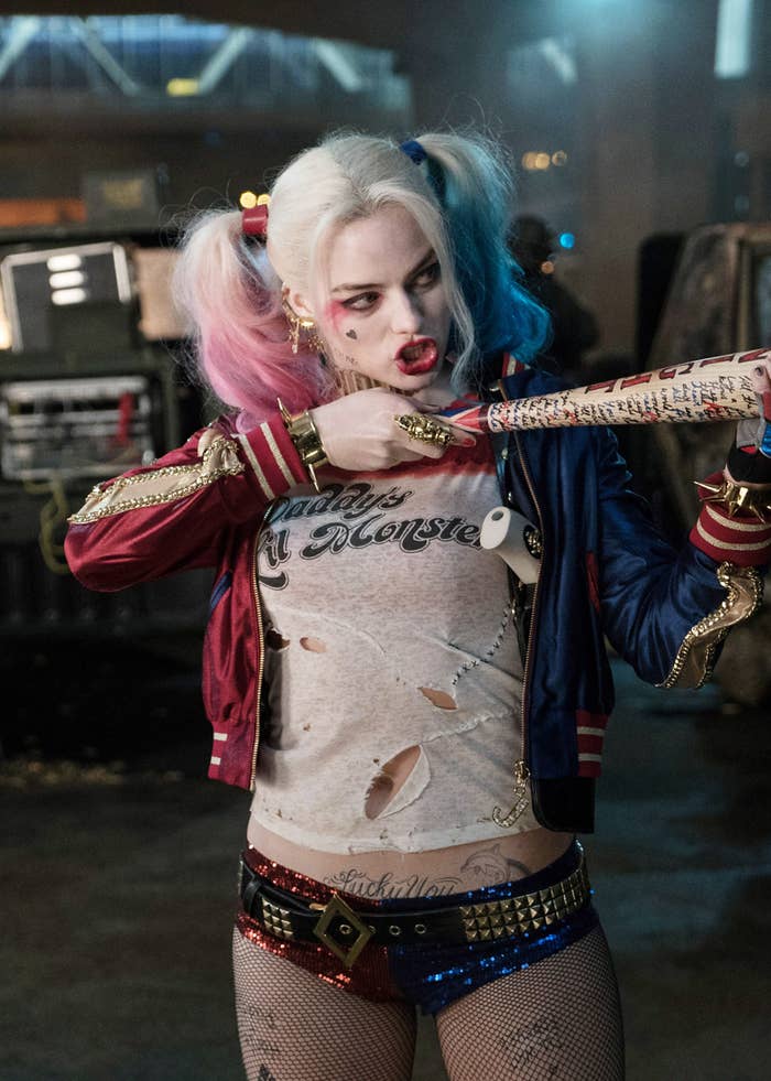 harley quinn in underwear and ripped T-shirt under a jacket