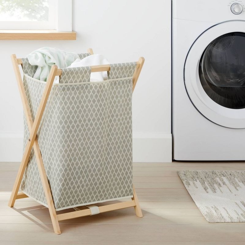 the hamper in a laundry room
