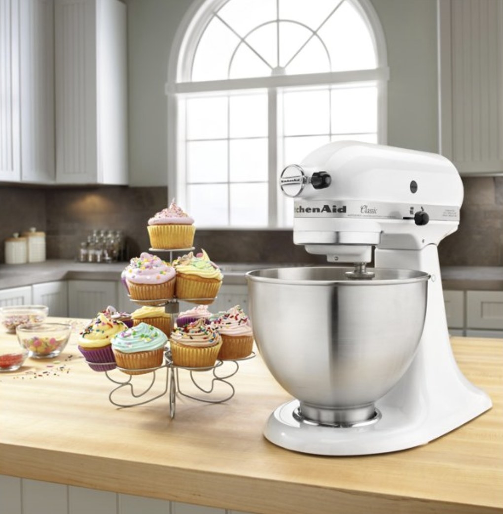white stand mixer and cupcakes