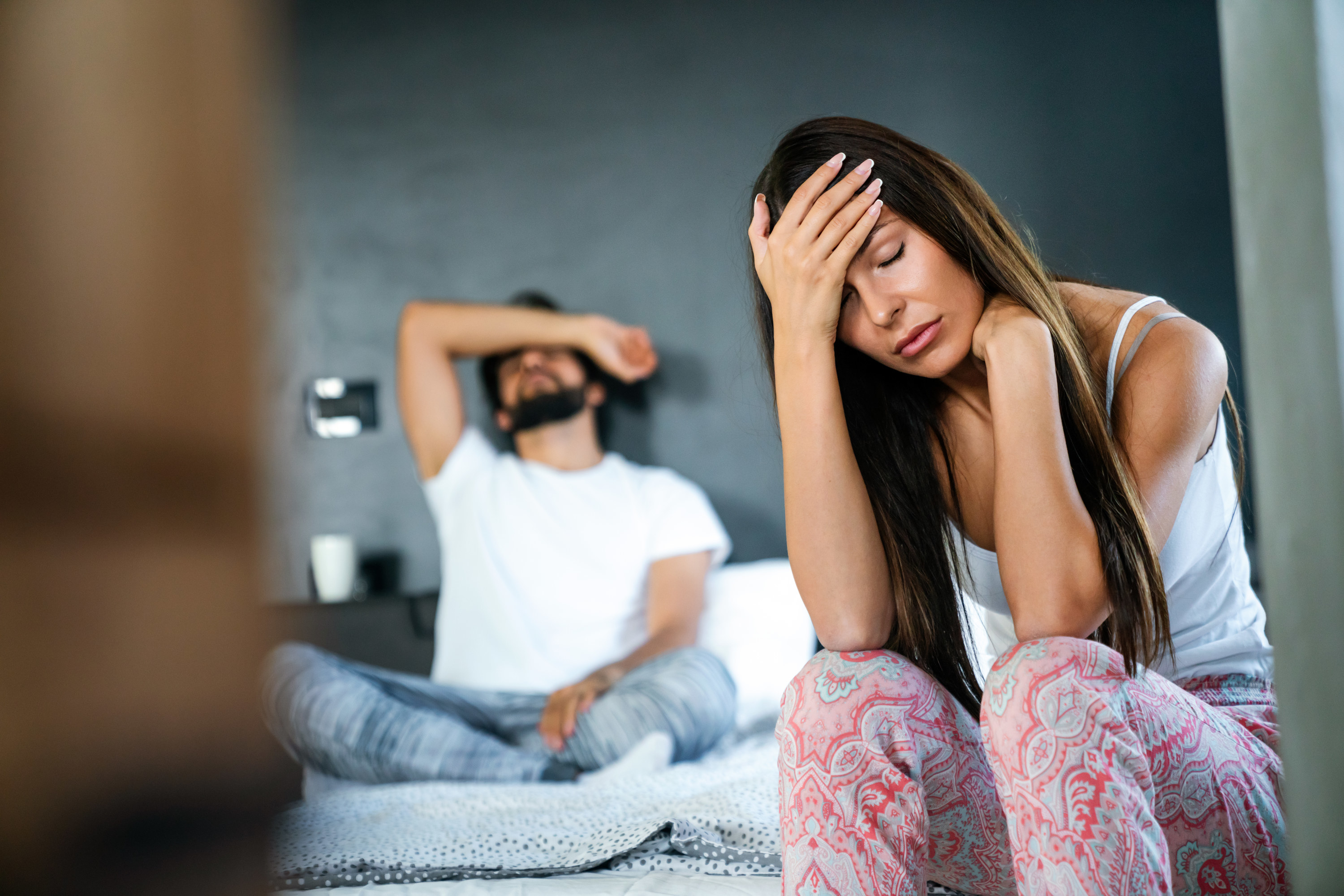 a man and a woman looking upset